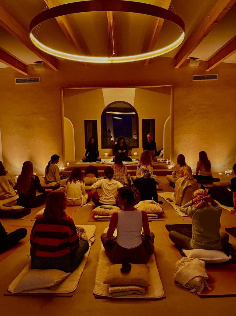 Candlelit meditation session in circular wellness temple