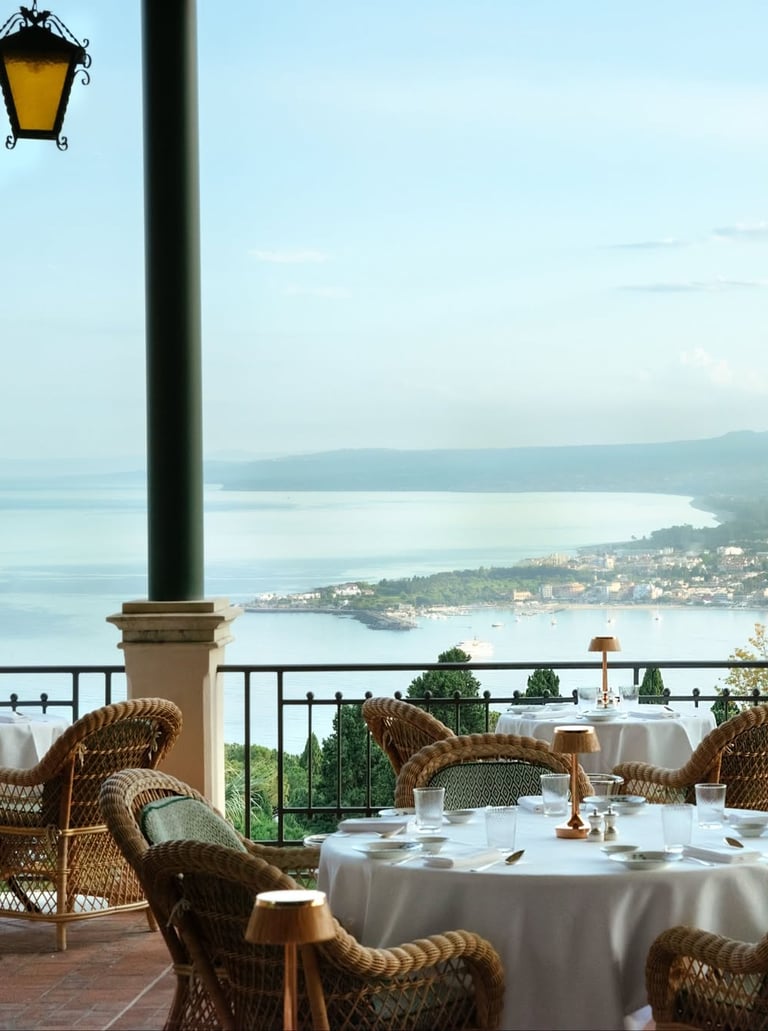 Seaside terrace restaurant with ocean view dining.
