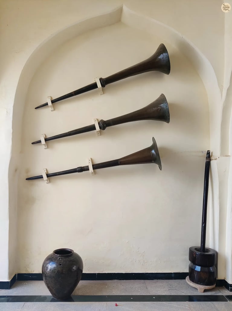Historic artefacts including utensils and instruments on display at Thanjavur Palace Royal Museum