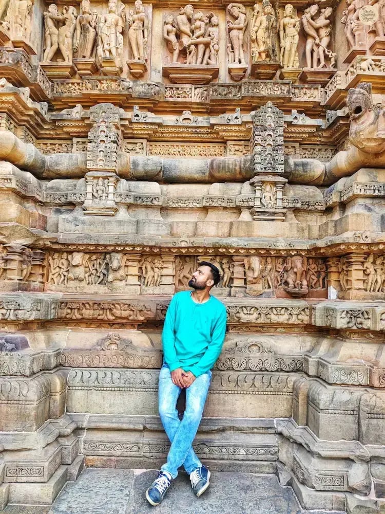 Close-up of intricate carvings on the outer wall of Lakshmana Temple, Khajuraho, Madhya Pradesh.