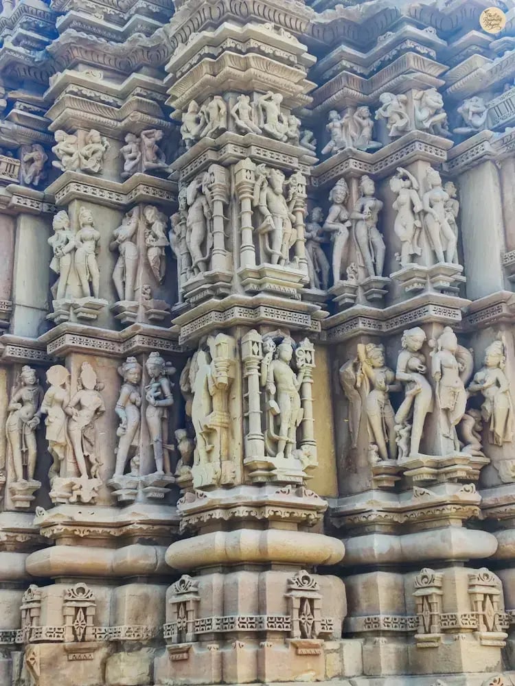 Stone sculptures on Vamana Temple khajuraho outer wall in Eastern Group of Temples Khajuraho.
