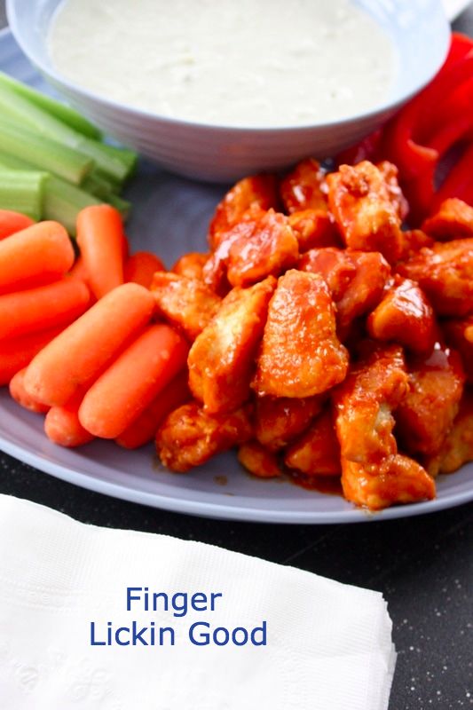 buffalo chicken bites with blue cheese dip and vegetables