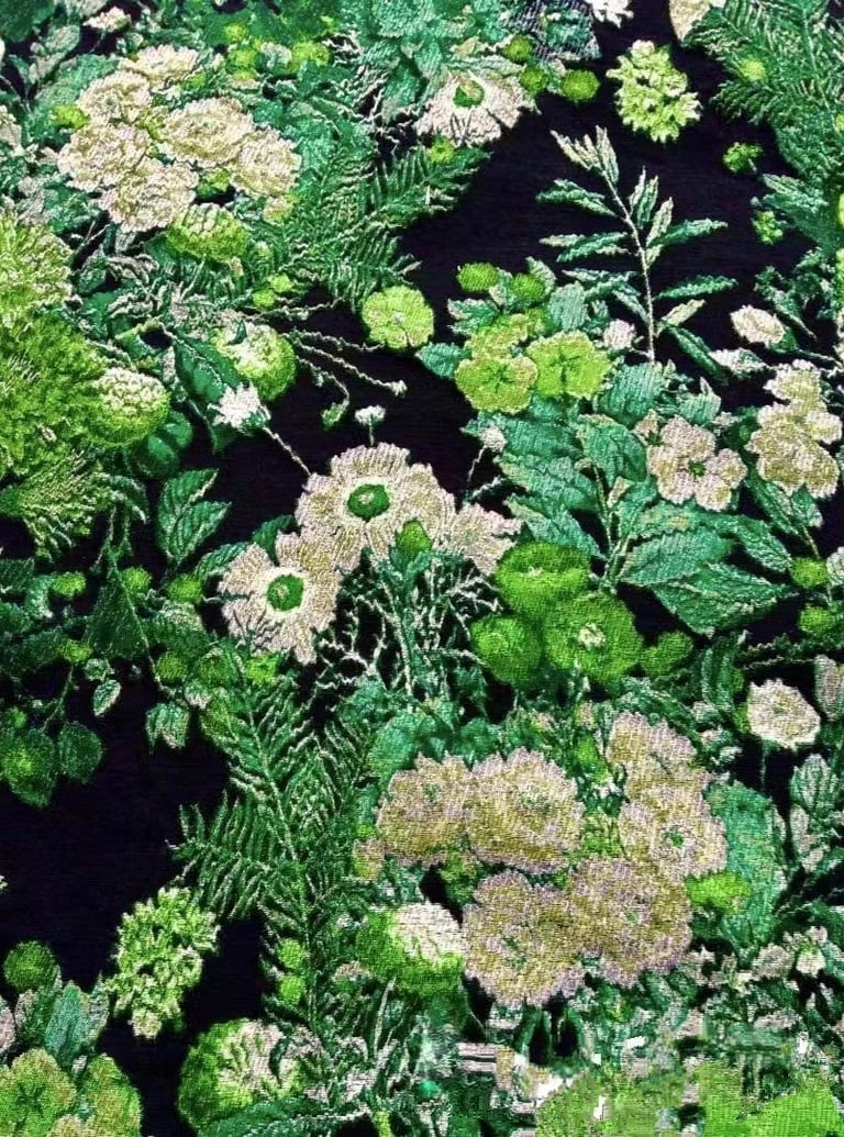 a bunch of flowers that are on a black background