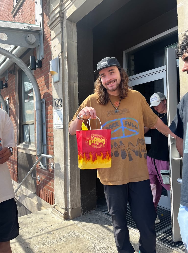Man holding a gift bag