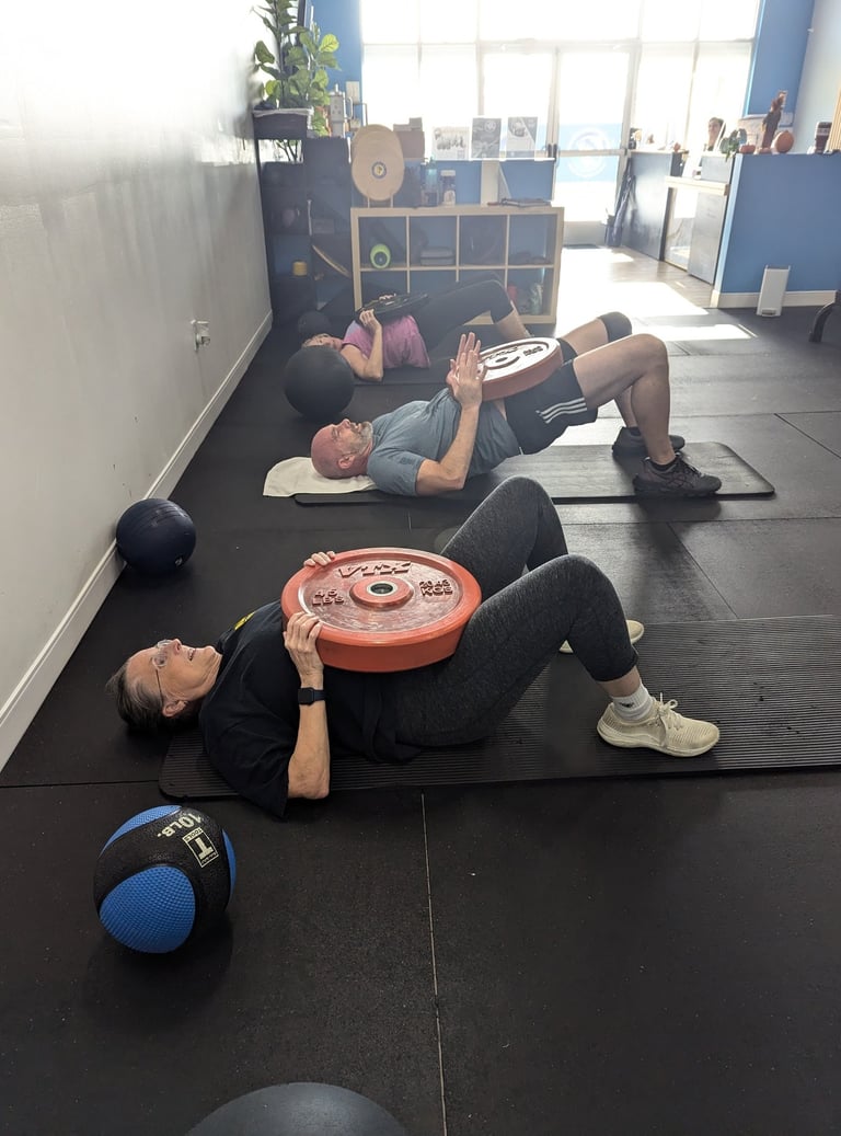 glute press with weighted plates