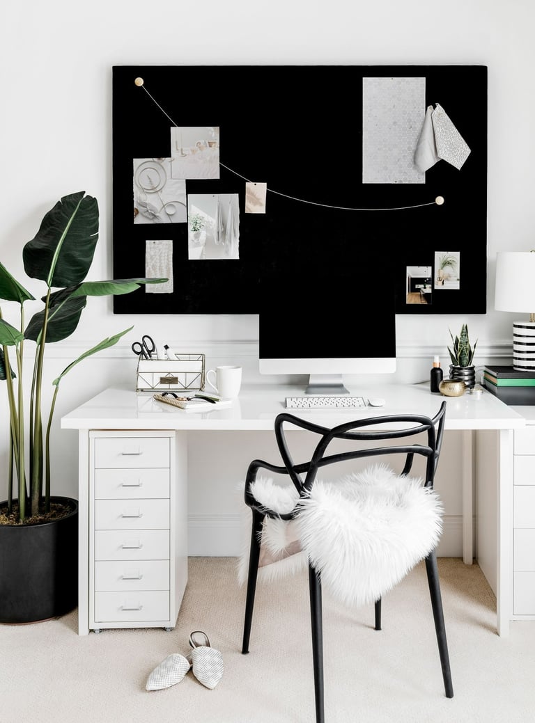 Narrow living room with multi-functional layout, slim sofa, workspace zone, light wood furniture, mo