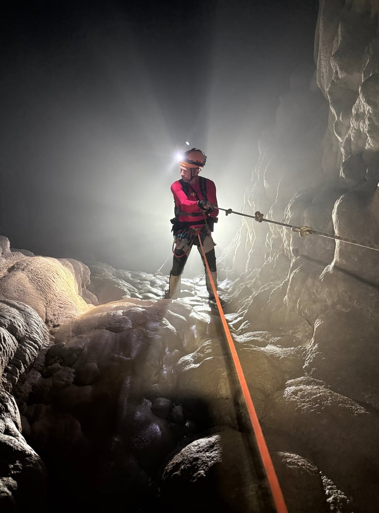 Nick Billington rappelling into the entrance of Hang Son Doong, Ke Bang National Park, Vietnam
