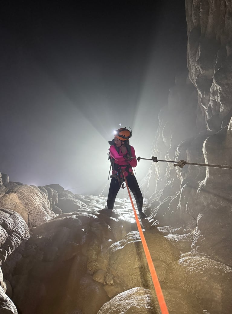 Tracey Billington rappelling into the entrance of Hang Son Doong, Ke Bang National Park, Vietnam
