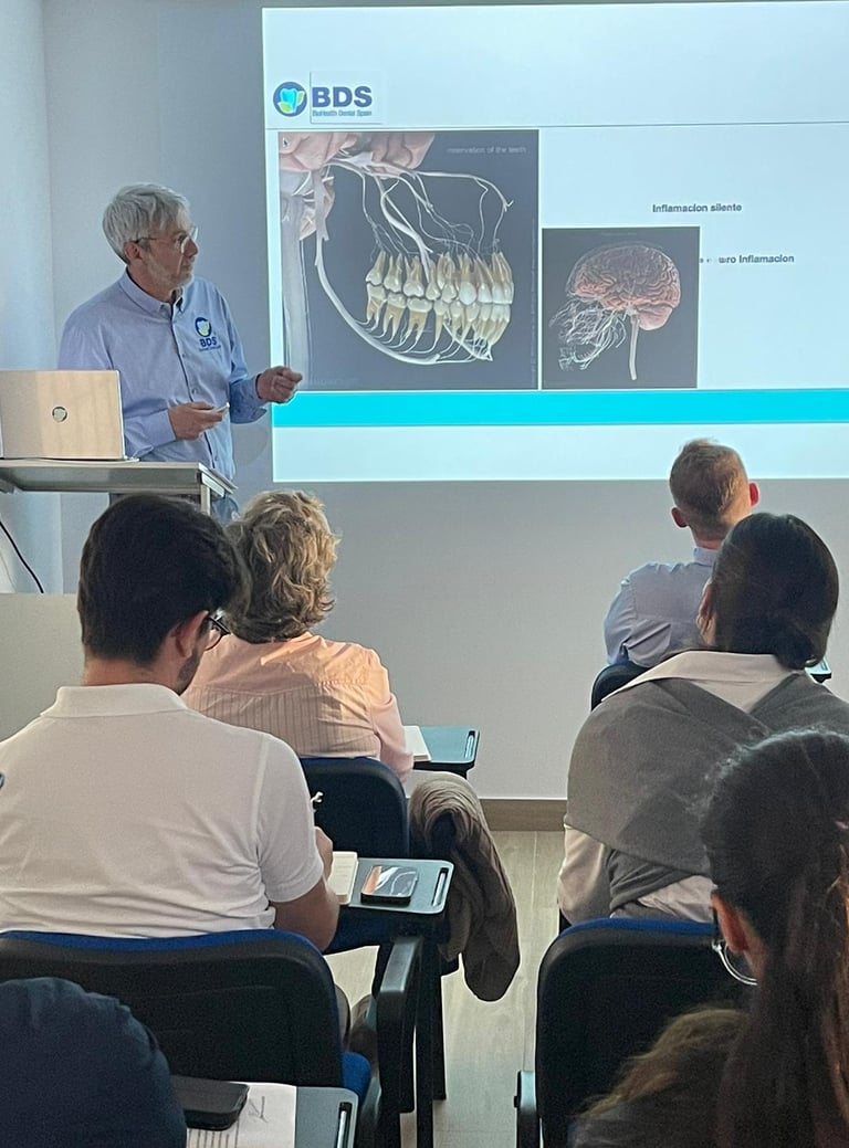 Dr Patrick giving a lecture about the connection between mouth and brain