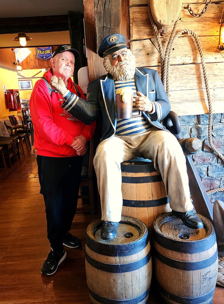 The Pirate makes a friend at Taberna Del Viejo Lobo in Ushuaia, Argentina