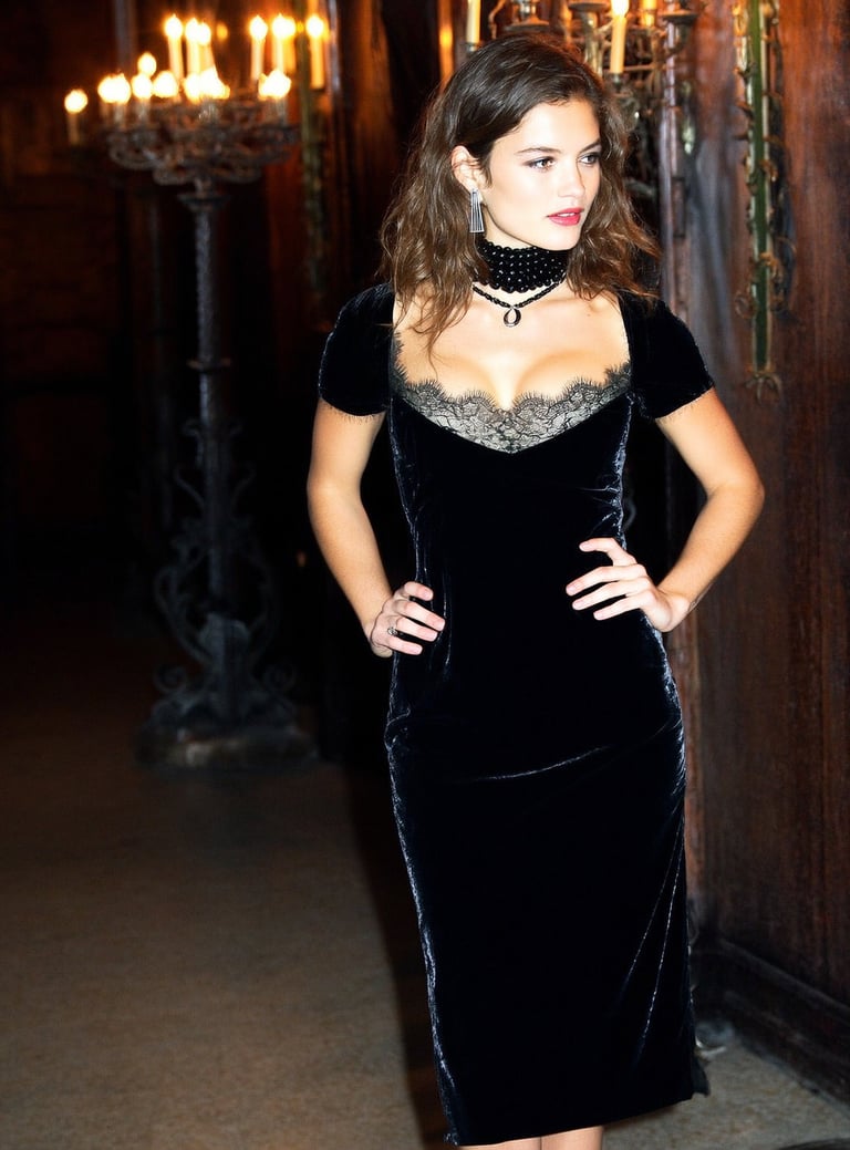 Gothic Halloween look with black velvet dress, onyx pearl choker, silver moon pendant, candlelight
