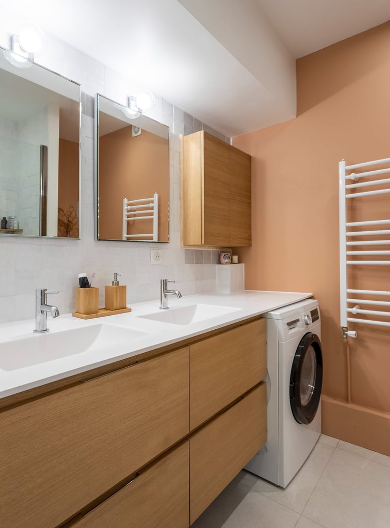 a washer and a washer in a bathroom