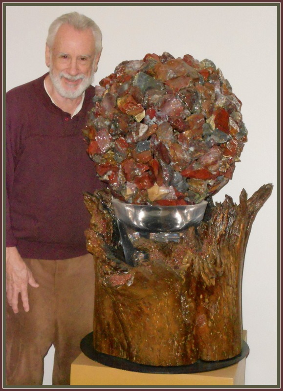 Jonny Haydn with his sculpture, "King Spheraf the Red"