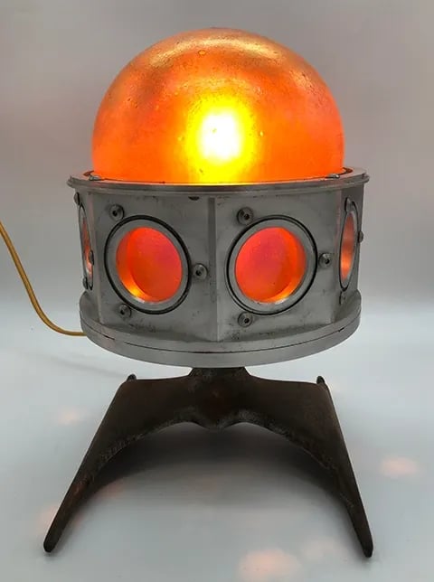 Lamp made from custom blown orange glass in aluminum body.