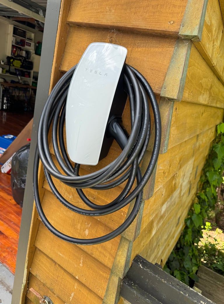 Tesla gen 3 type 2 EV charger certified installer , registered electrician Sparky G ltd