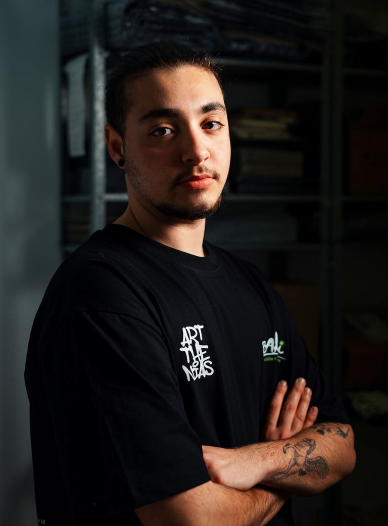 a man with a tattoo on his arm