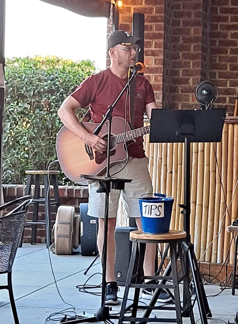 William Finn from Finn's Echo performing in front of live audience