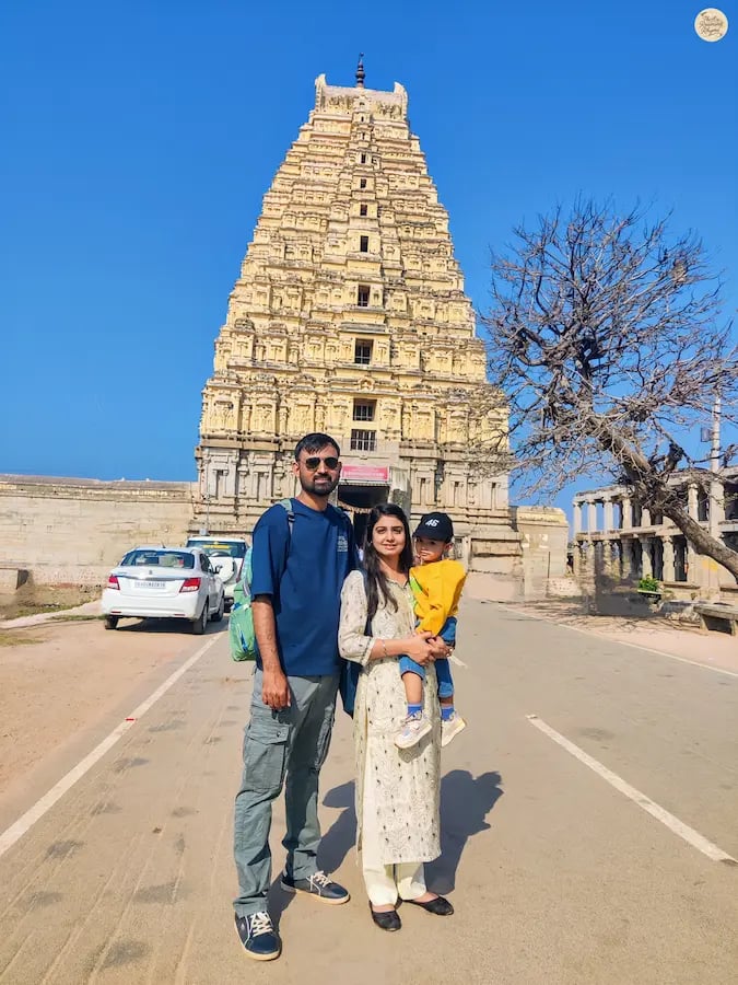 Couple together at Virupaksha Temple's Raj Gopuram, Hampi.