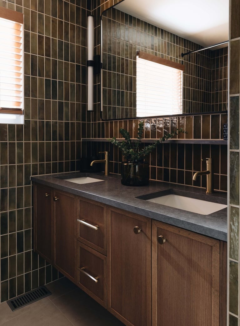 a bathroom with a sink and a large mirror