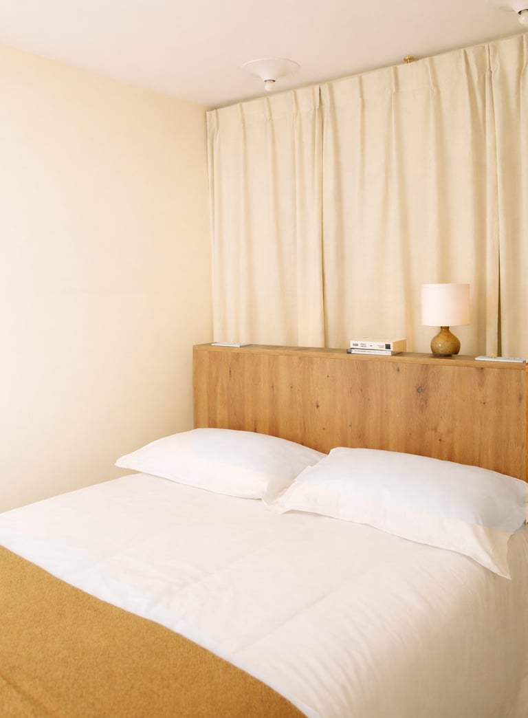 Bedroom in Pau with ottoman bed and custom-made dressing