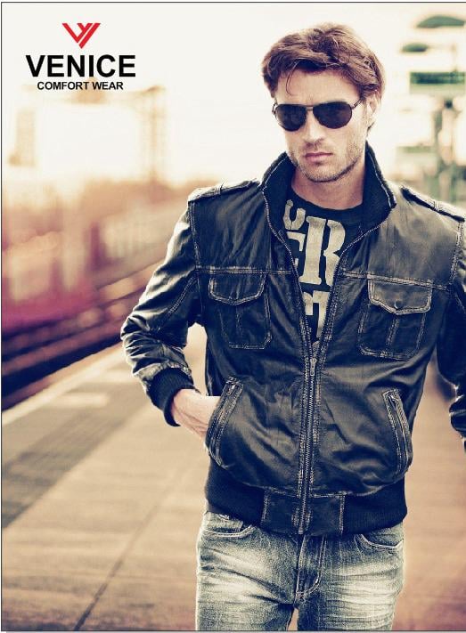 a man in a leather jacket and sunglasses