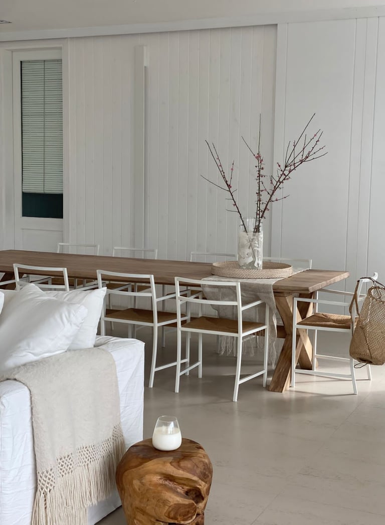 a living room with a couch and a table