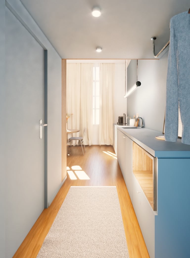 hall d'entrée peint en bleu pastel, continuité avec la cuisine linéaire
