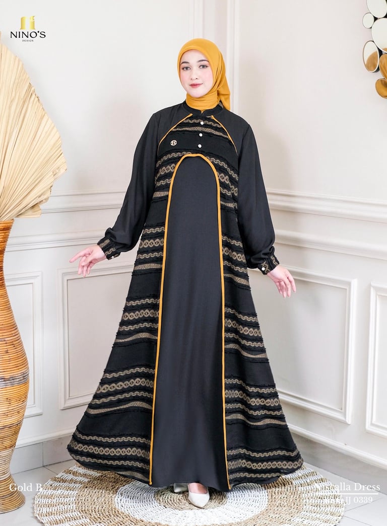 a woman in a black dress and yellow hijab