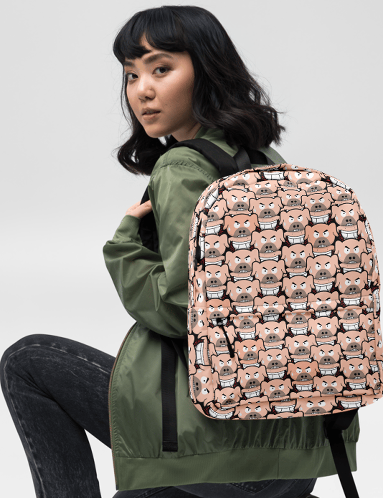 A young woman wearing a green bomber jacket and a pink backpack with a cartoon pig pattern.