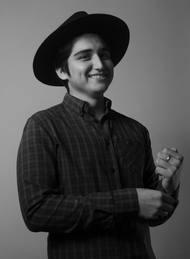 a man in a hat and a hat on a gray background