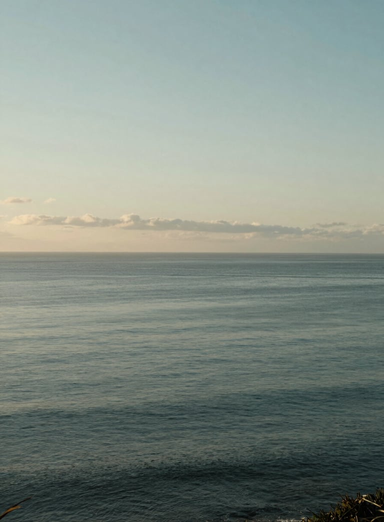 A serene landscape of the Sunshine Coast, Australia, with a calm ocean under a soft morning sky, featuring muted slate green and mist tones.