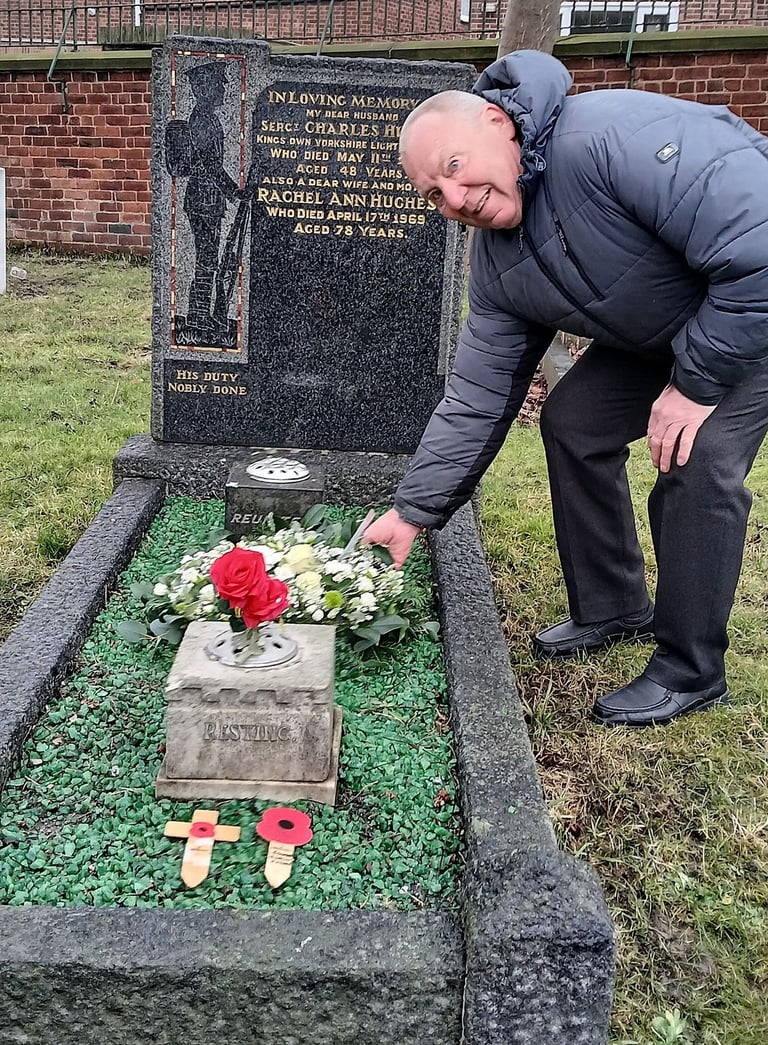 John Hughes laying a wreath in remembrance of his grandfather, Sergeant Charles Hughes