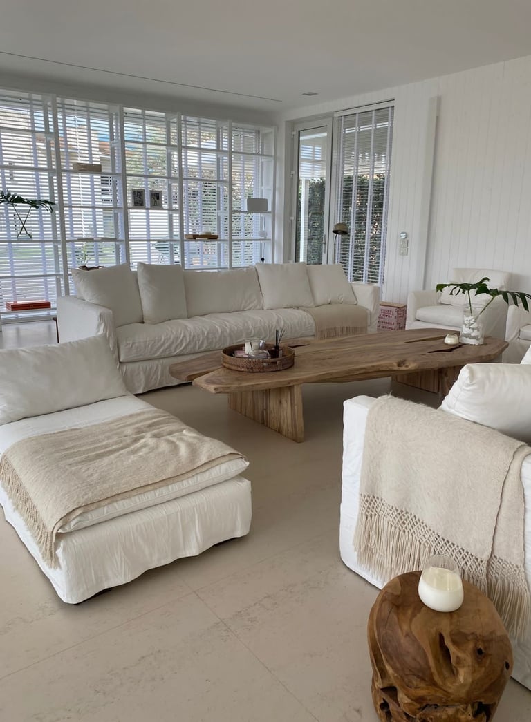 a living room with a couch and a table