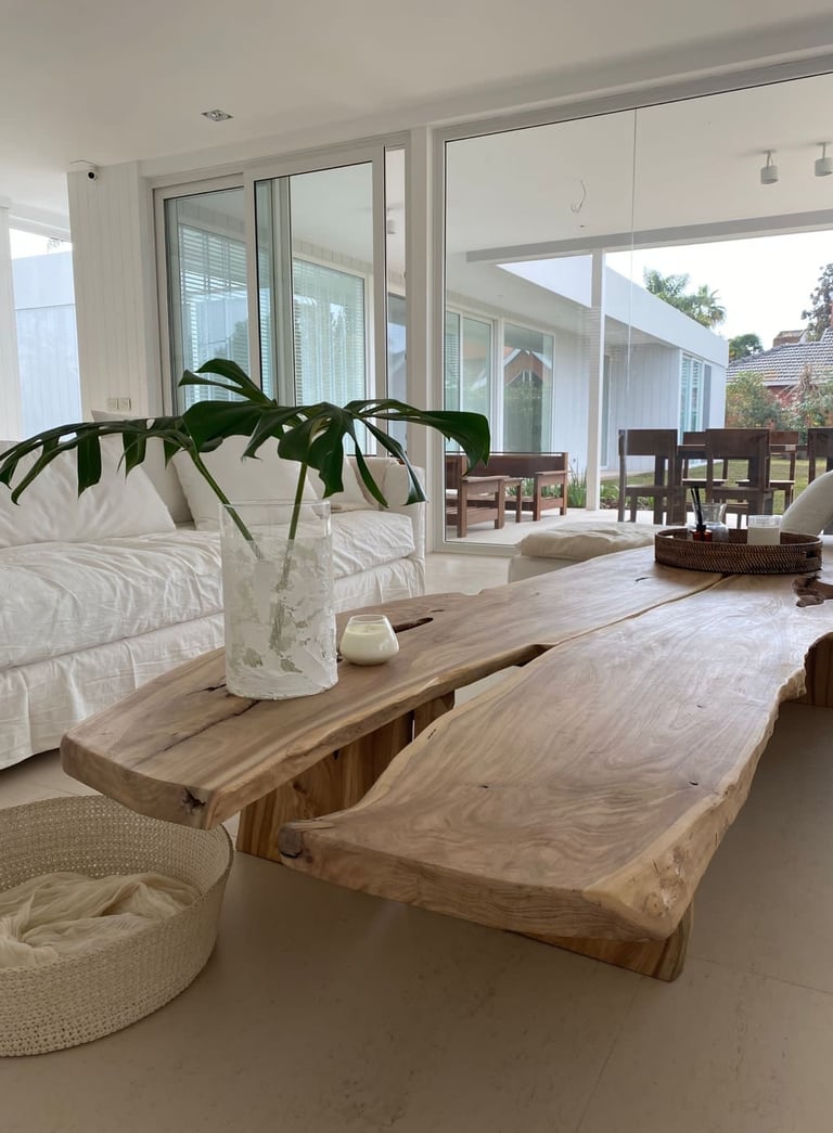 a living room with a couch and a table