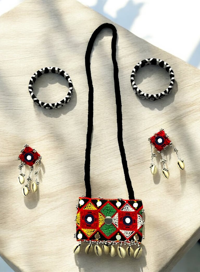 a necklace and earrings on a table