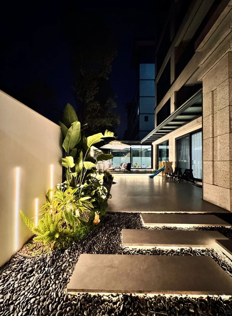 Minimalist garden pathway with integrated landscape lighting.