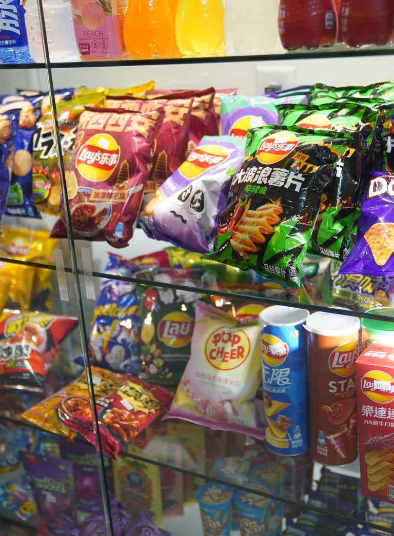 Chinese and Japanese lays chips, Pringles, flavored popcorn and gummy candy exotic