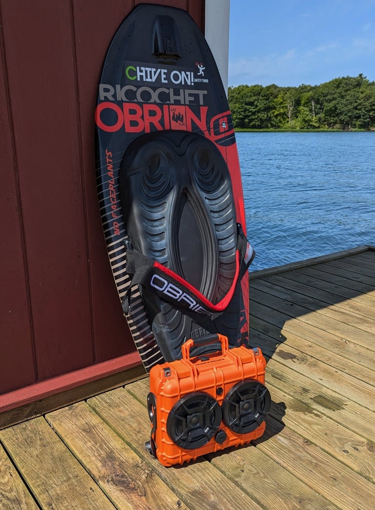 awesome chillantix boombox by a kneeboard on a dock