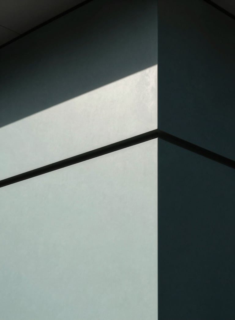 A minimalist, high-end close-up of architectural details, focusing on the interplay of light and shadow on a smooth facade. The color palette includes dark charcoal and pale celadon, reflecting a mood of modern professionalism.