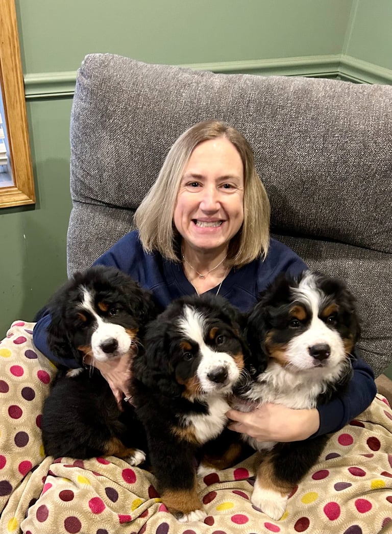 Debbi with litter of three BMD puppies
