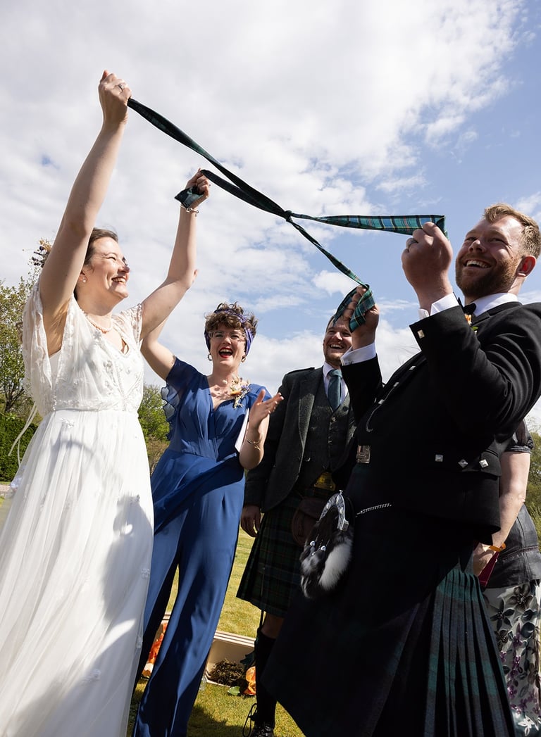 a wedding couple handfasting
