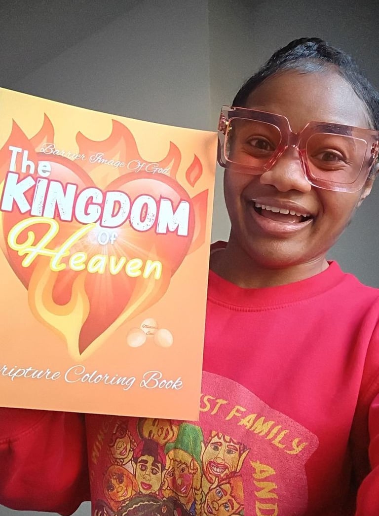 A smiling woman holding The Kingdom of Heaven scripture coloring book while wearing red glasses.