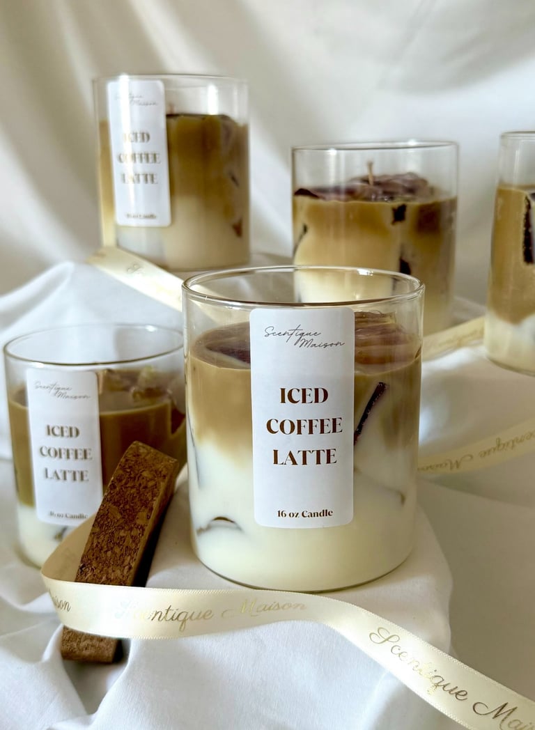 Luxury coffee and caramel candle with a ribbon around it with gold lettering 