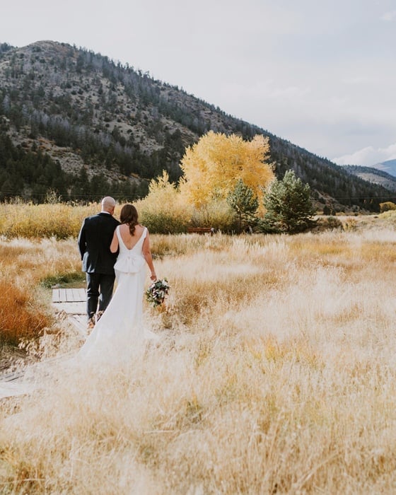 couple with mountain views in the fall
