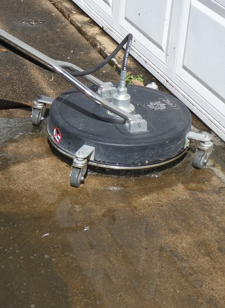 pressure washing to clean a garage