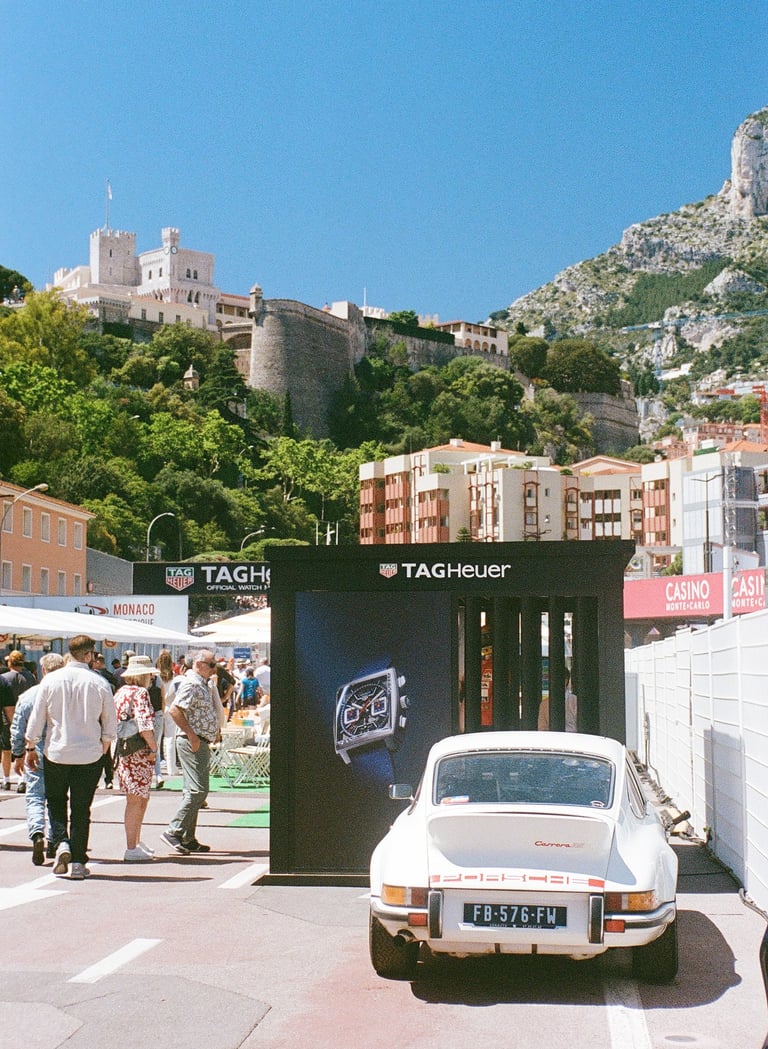 a race car parked in the paddock in Monaco