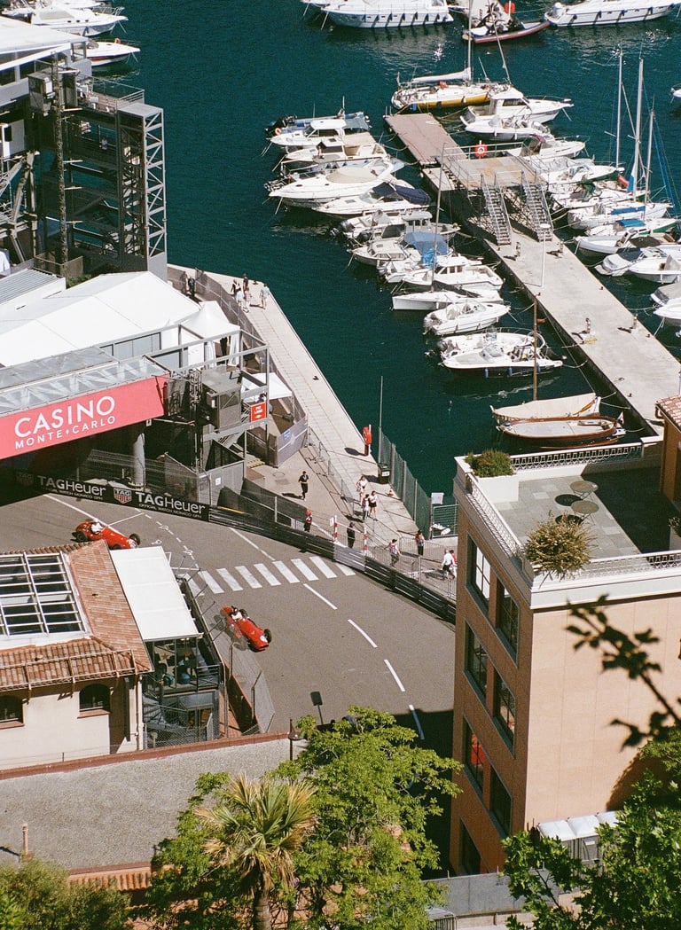race cars driving on the Monaco Grand Prix circuit