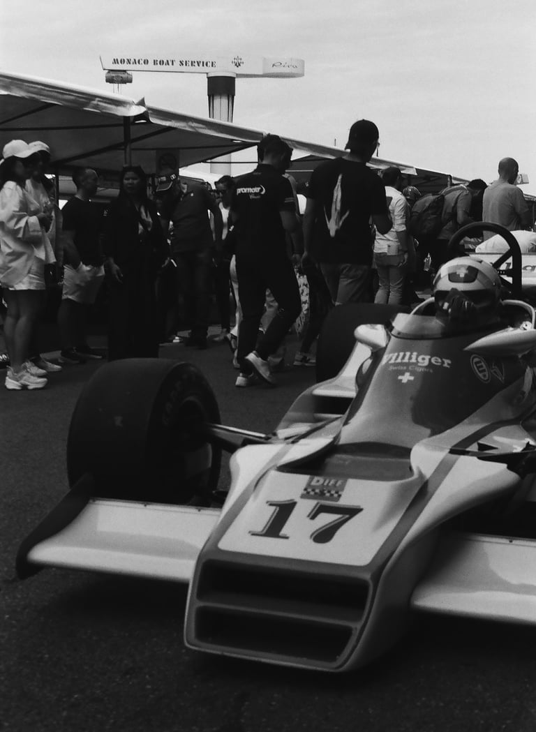 a race car driver getting ready before the race