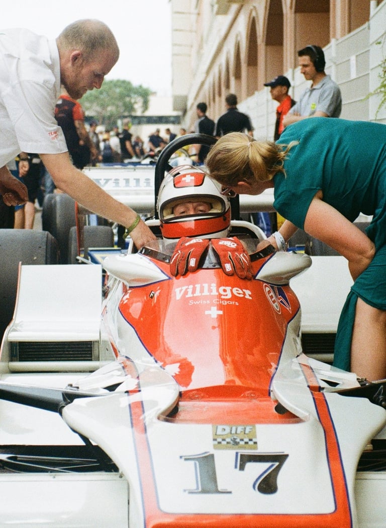a race car driver getting ready before the race