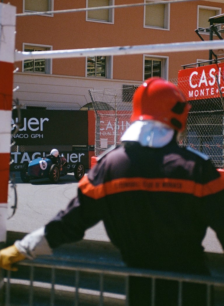 Race marshal watching pre-war Grand Prix cars race at Monaco